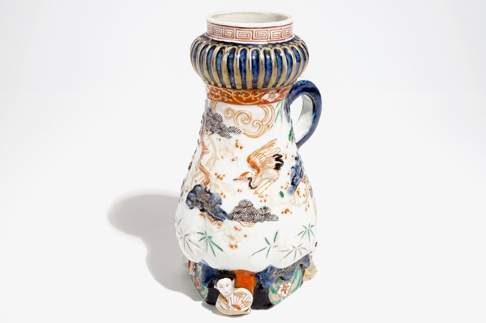 A Japanese Imari coffee jug with applied design, Edo, late 17th C.