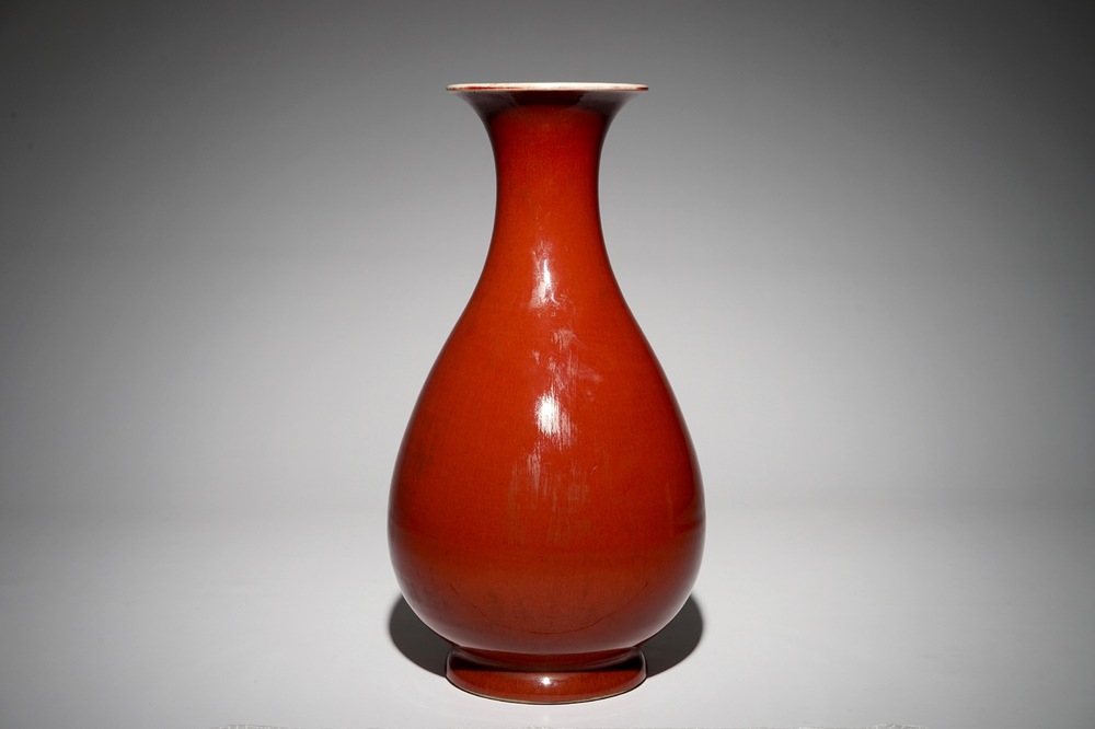 A Chinese monochrome red yuhuchunping vase, 19th C.