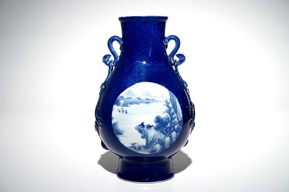 A Chinese blue and white hu powder blue-ground vase with landscape medallions, Qianlong mark, 19/20th C.