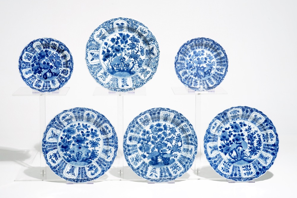 Four Chinese blue and white plates and two smaller plates, Kangxi