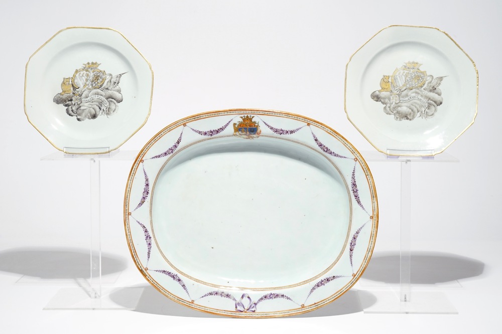 A pair of Chinese octagonal grisaille armorial plates and an oval famille rose armorial dish, Qianlong