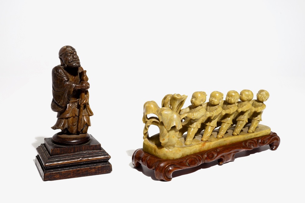 A Chinese soapstone Cultural Revolution group, 20th C. and a figure of a sage, 19th C.