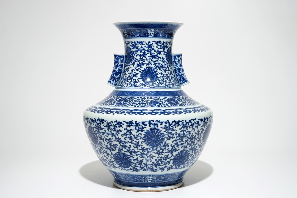 A Chinese blue and white lotus scroll hu vase, Qianlong mark, 19th C.