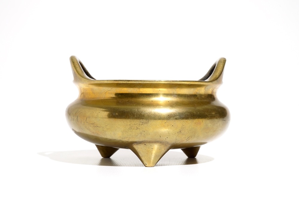 A Chinese bronze tripod censer, Xuande mark, 19th C.