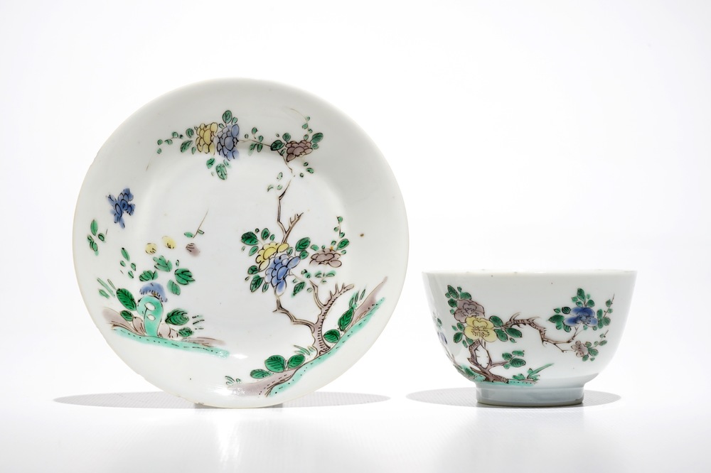 A Chinese famille verte cup and saucer with yin-yang mark, Kangxi