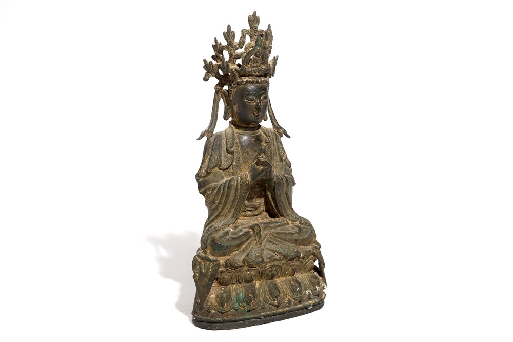 A Chinese inscribed and dated gilt bronze figure of Guanyin, Ming