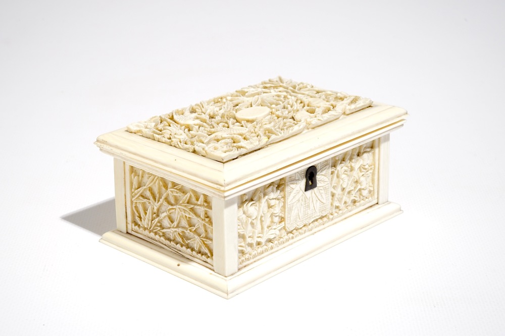 A rectangular Chinese carved ivory casket, Canton, 19th C.