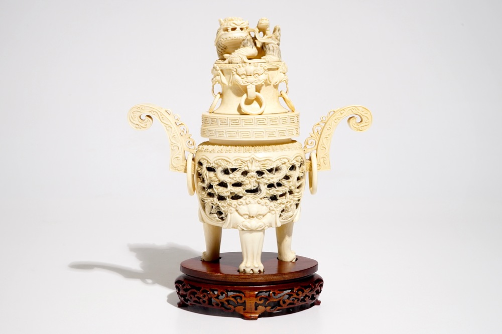 A Chinese reticulated ivory incense burner on stand, ca. 1900