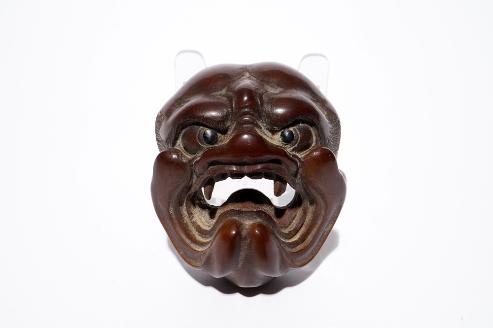 A Japanese carved boxwood netsuke of a devil&rsquo;s or demon&rsquo;s head, Edo/Meiji, 18/19th C.
