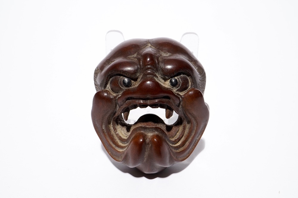 Een Japanse buxushouten netsuke met een duivels- of demonenkop, Edo/Meiji, 18/19e