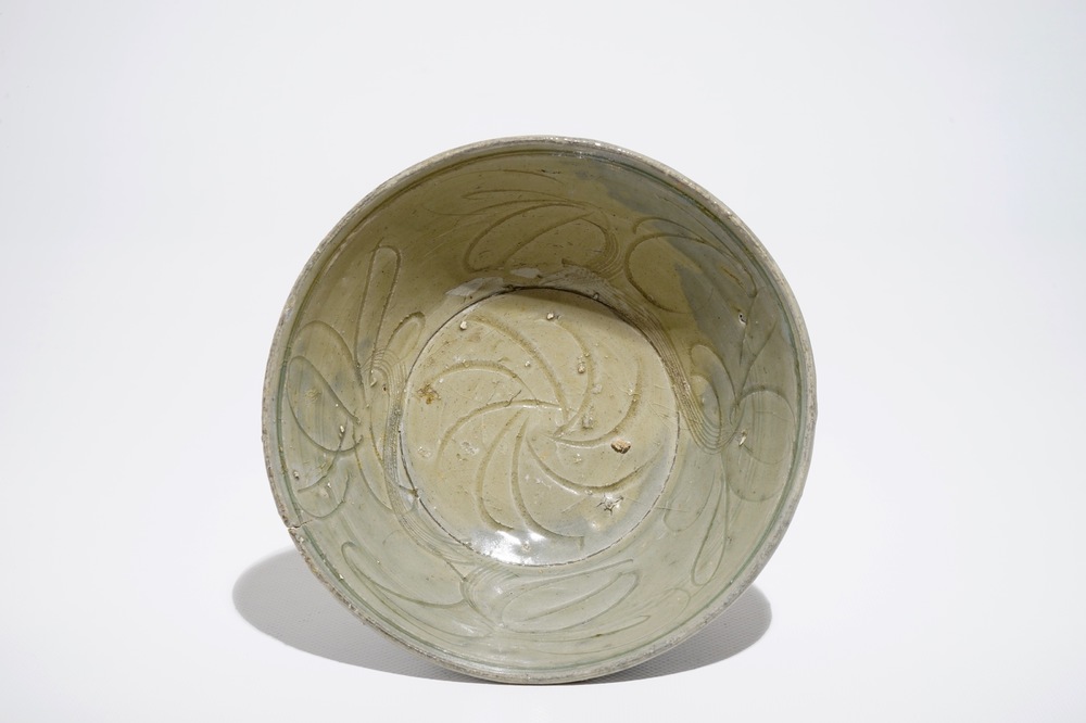 A Chinese incised celadon shipwreck bowl, Song