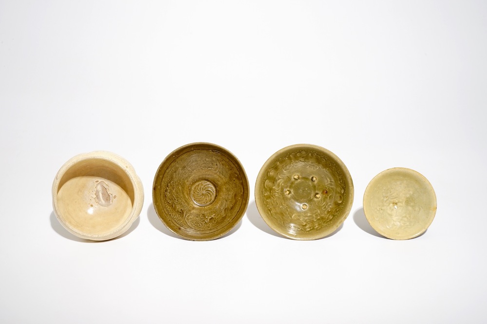 Four Chinese monochrome celadon- and cream-glazed bowls, Song and later