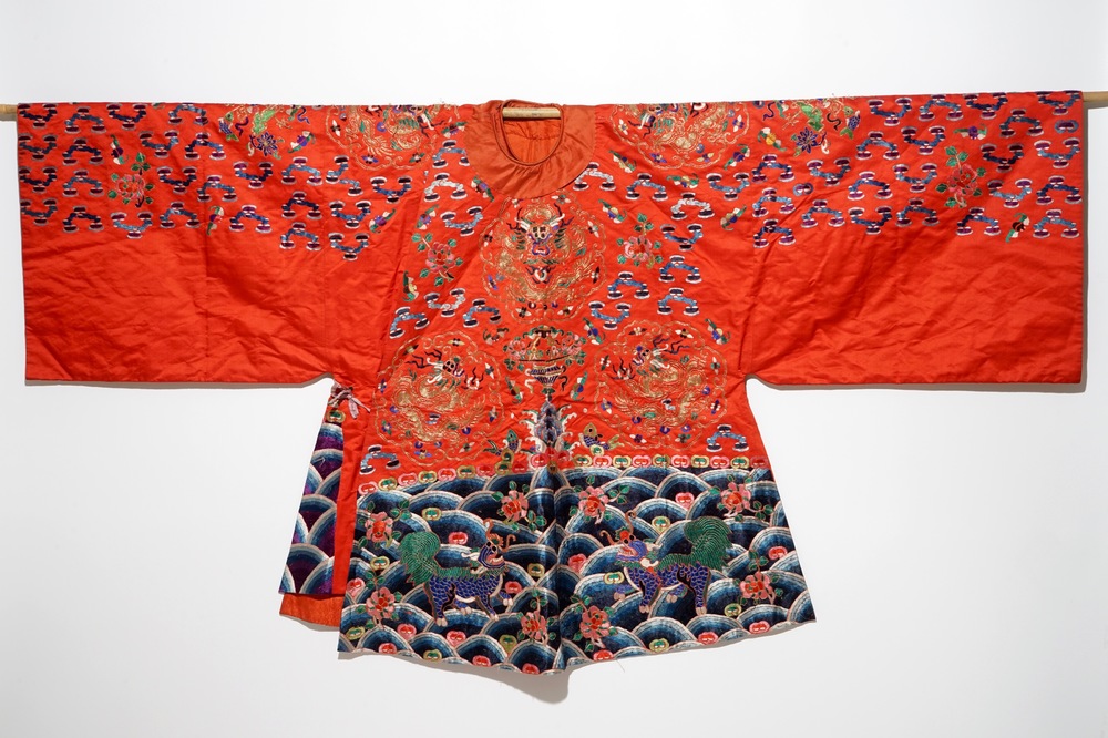 A Chinese embroidered red silk robe, Qing