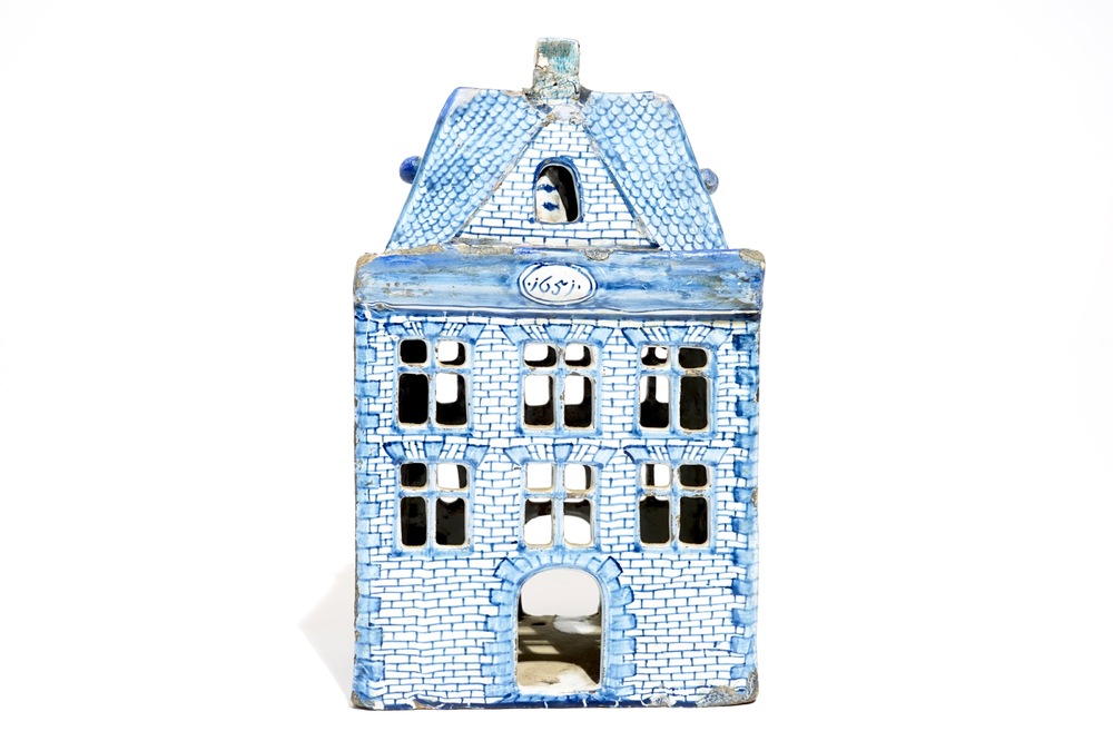 A Dutch Delft blue and white model of a house, 18th C.