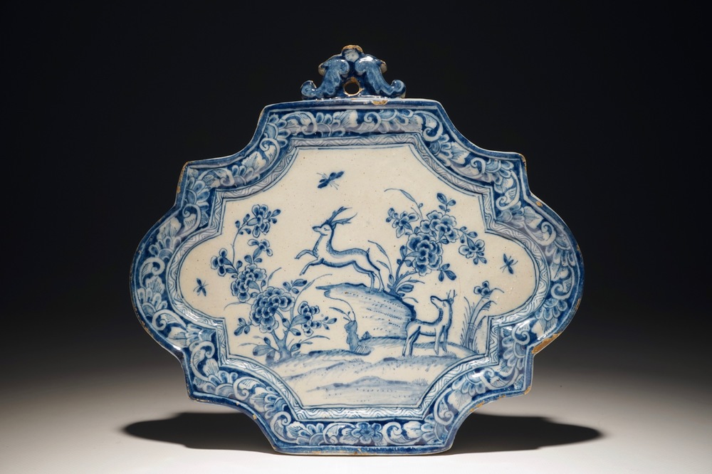 A Dutch Delft blue and white plaque with deer, 18th C.