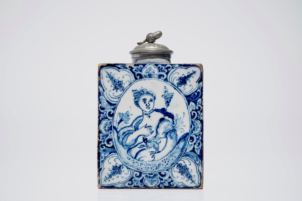 A rectangular Dutch Delft blue and white tea caddy with erotical design, 18th C.