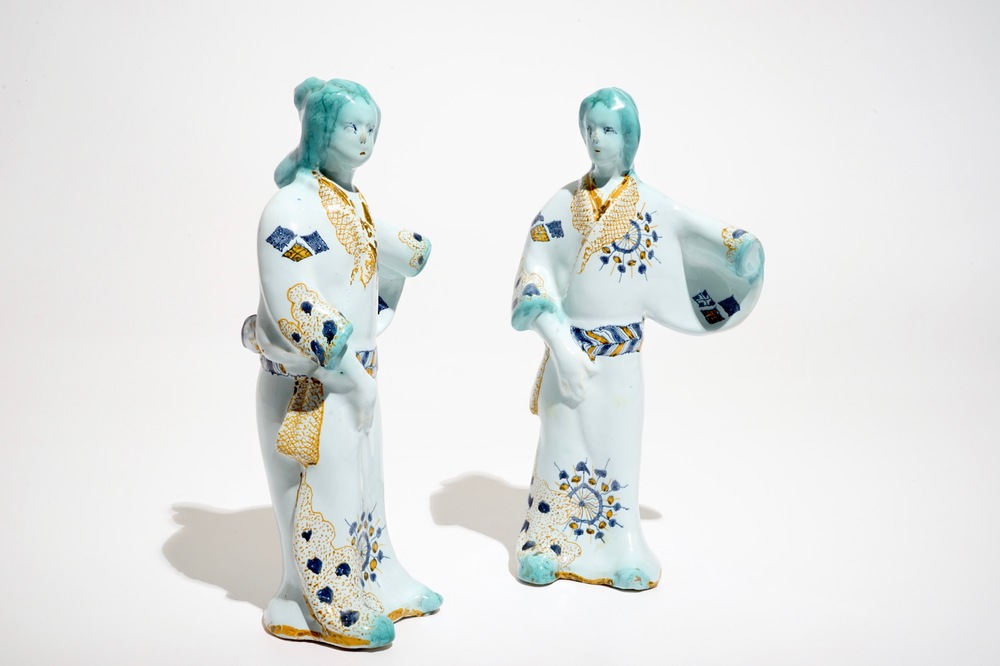 A pair of French faience models of Chinamen, Strasbourg, 18th C.