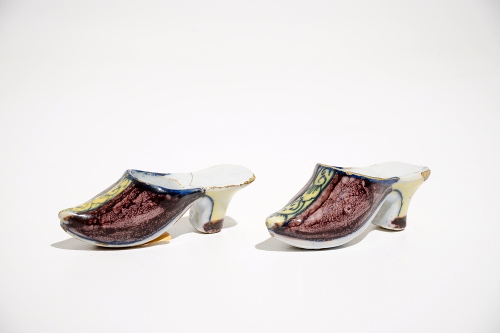 A pair of small polychrome Dutch Delft slippers, 18th C.