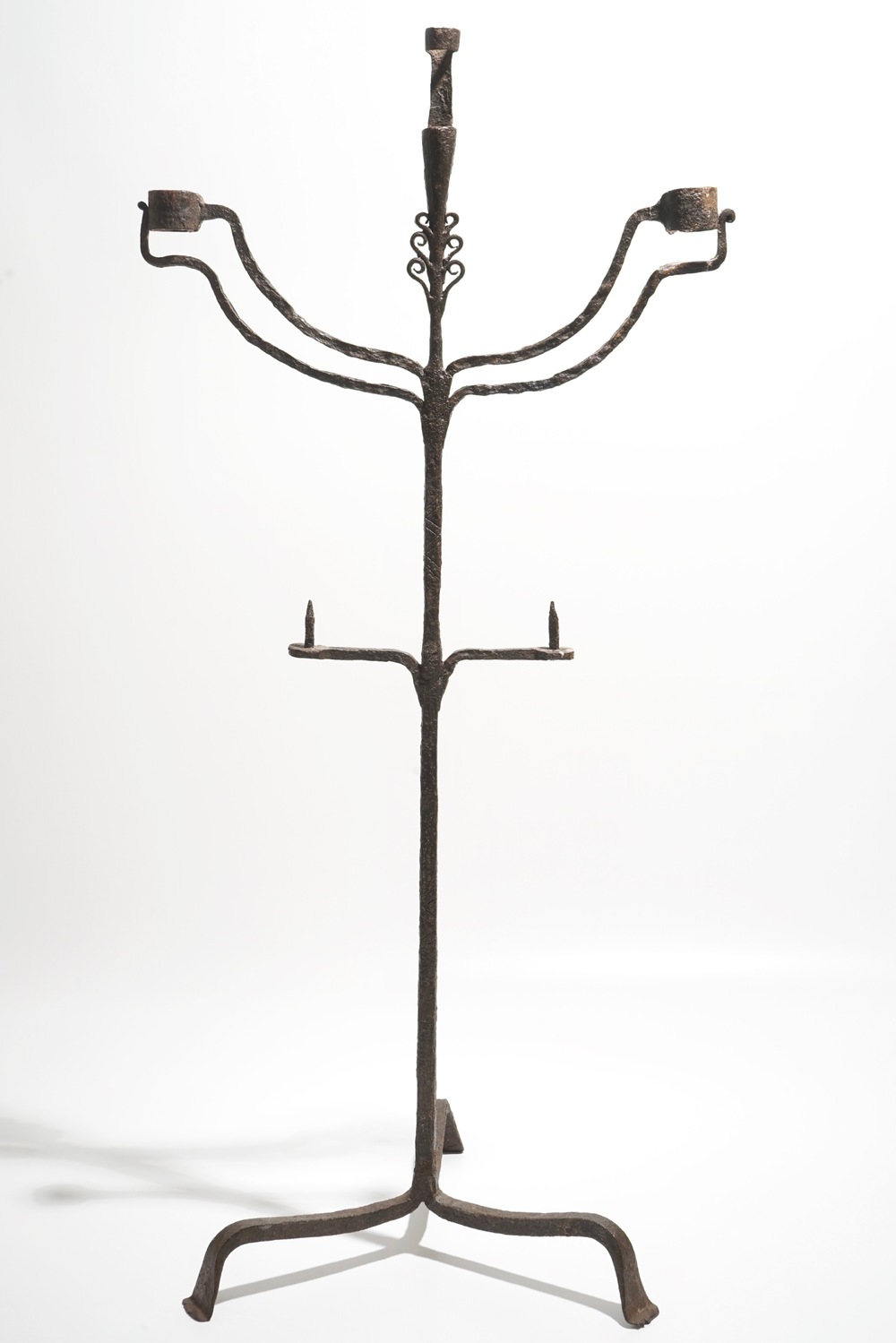 A wrought iron floor standing candleholder, probably 17/18th C.