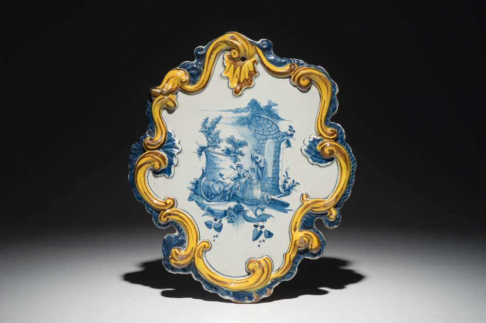 A Dutch Delft mixed technique plaque with a fine pastoral scene, 18th C.