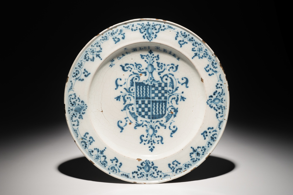 A Spanish blue and white inscribed armorial charger, Talavera, 18th C.