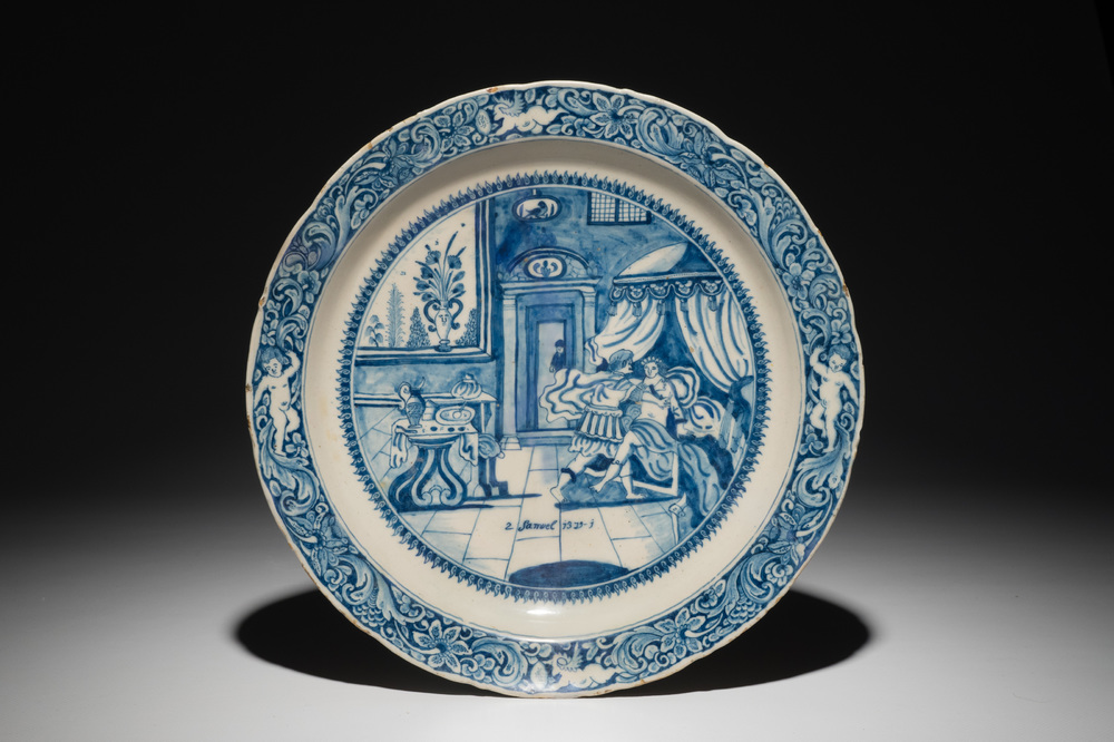 Un plat en fa&iuml;ence de Delft bleu et blanc &agrave; sujet religieux d'Amnon et Tamar, dat&eacute; 1716