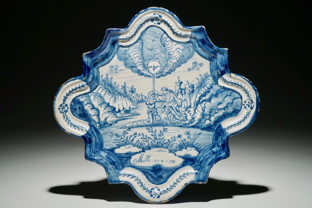 A Dutch Delftware blue and white biblical plaque with &quot;The Baptism of Christ&quot;, Amsterdam, dated 1767