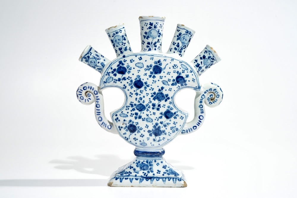 A Dutch Delft blue and white tulip vase with floral design, 18th C.