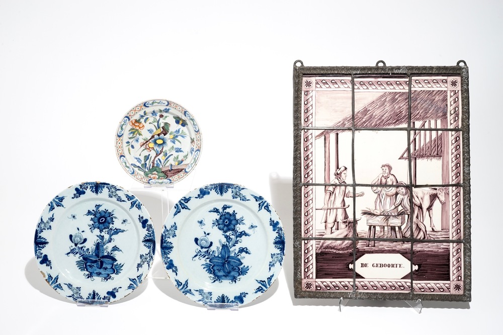 A manganese Dutch Delft tile panel and three Delft dishes, 18/19th C.