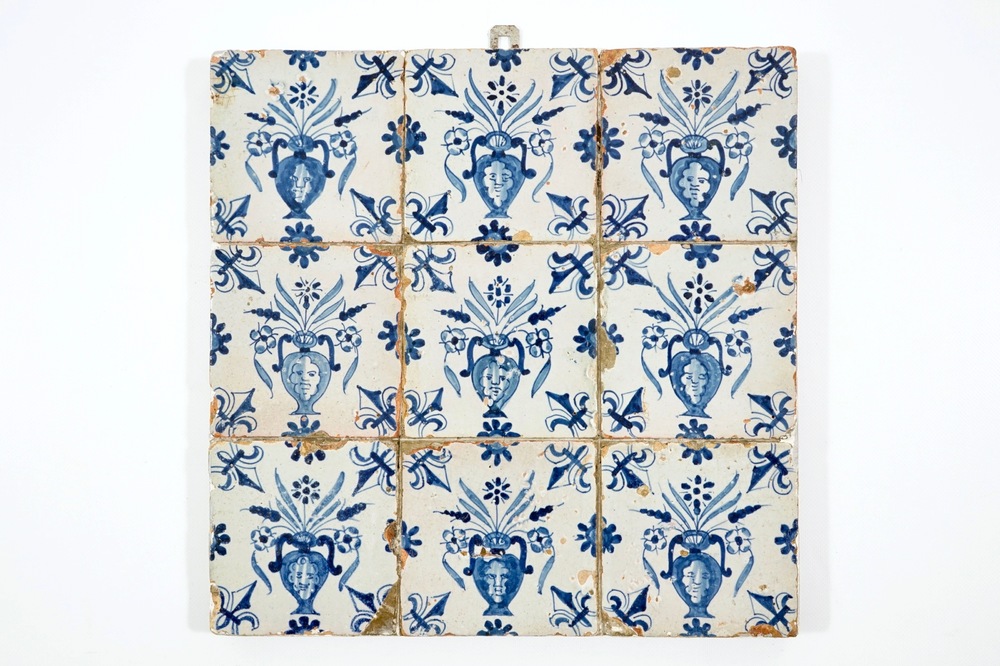 A field of 9 Dutch Delft blue and white tiles with masked flower vases, 1st half 17th C.