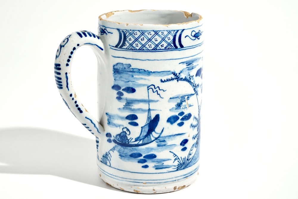 A large Dutch Delft blue and white chinoiserie beer mug, 18th C.