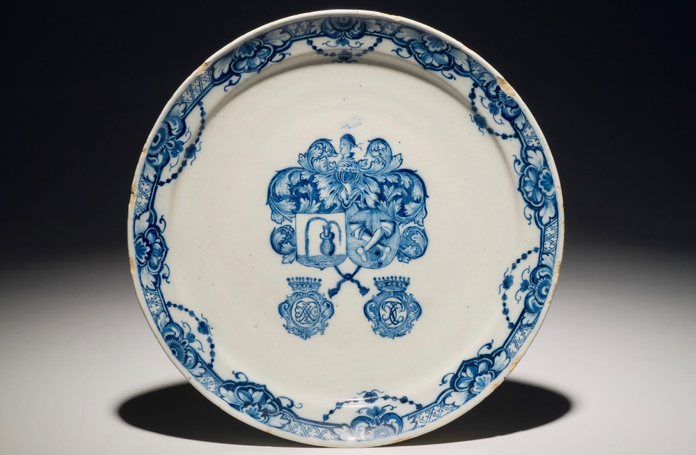 An armorial Dutch Delft blue and white alliance plate, 1st half 18th C.