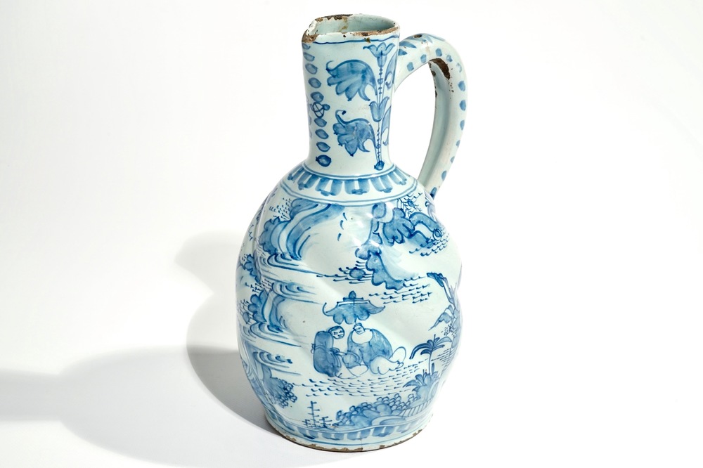 A Dutch Delft blue and white chinoiserie jug, 2nd half 17th C.
