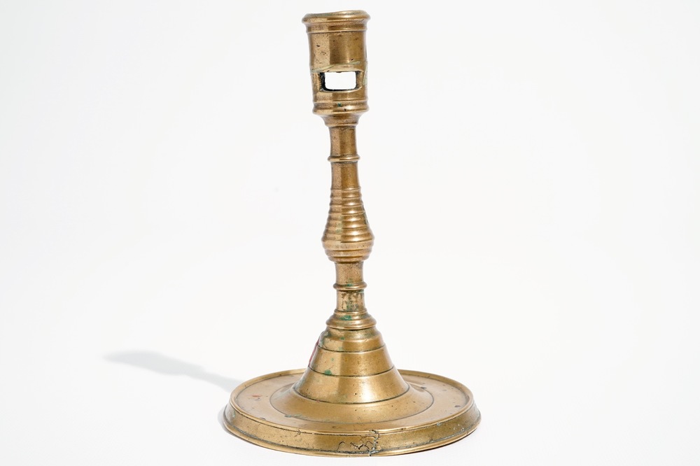 A gothic bronze candlestick, Low Countries, 16th C.