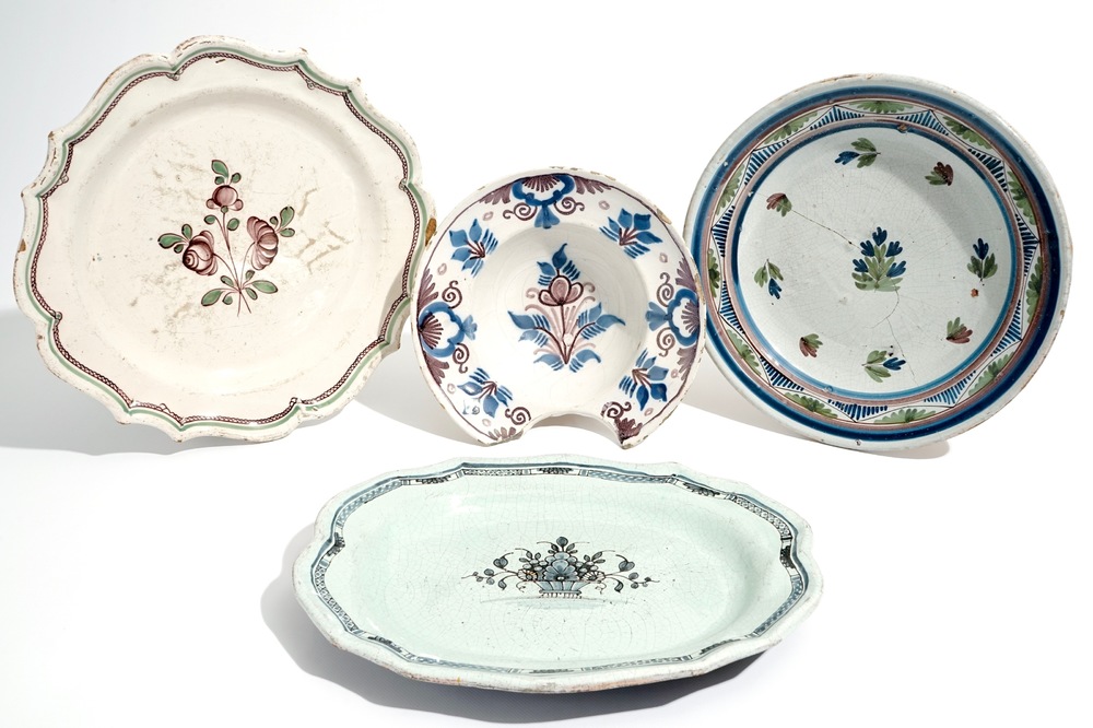 Four various French faience dishes, incl. a barber's or shaving bowl, 18th C.