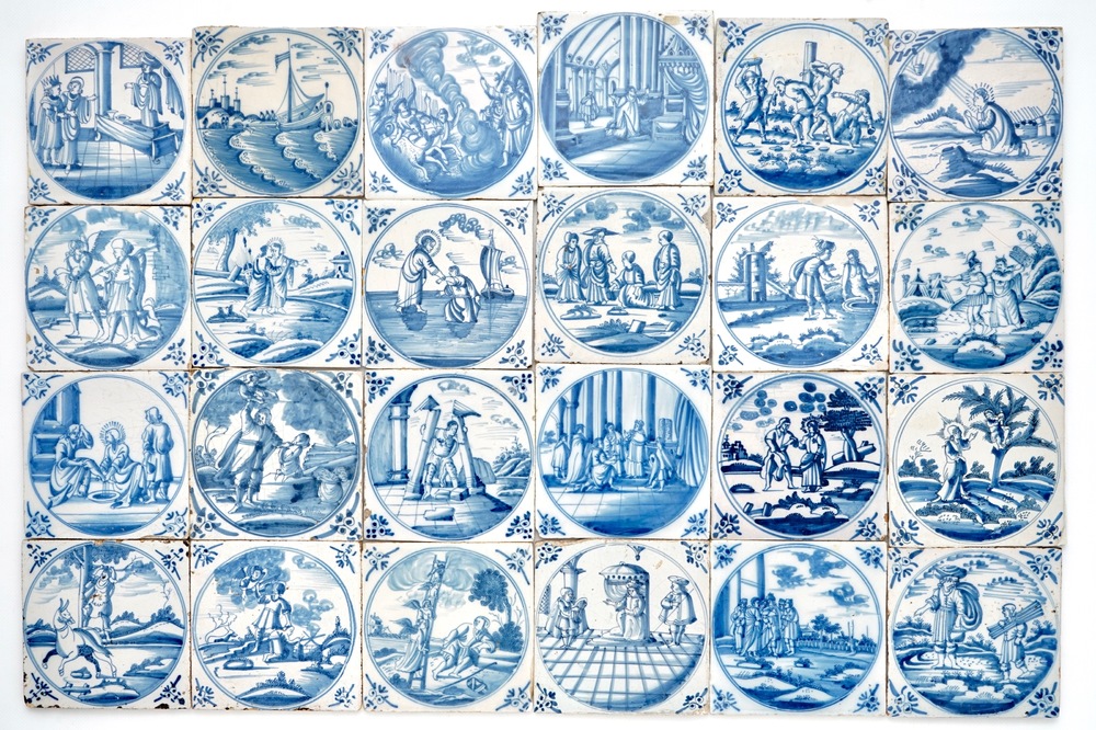 Un ensemble de 24 carreaux en fa&iuml;ence de Delft bleu et blanc aux sujets religieux, 18&egrave;me