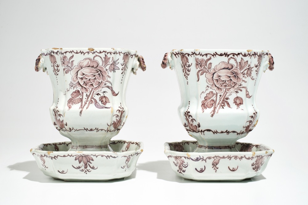 A pair of Dutch Delft manganese jardinieres on stands with floral designs, 18th C.