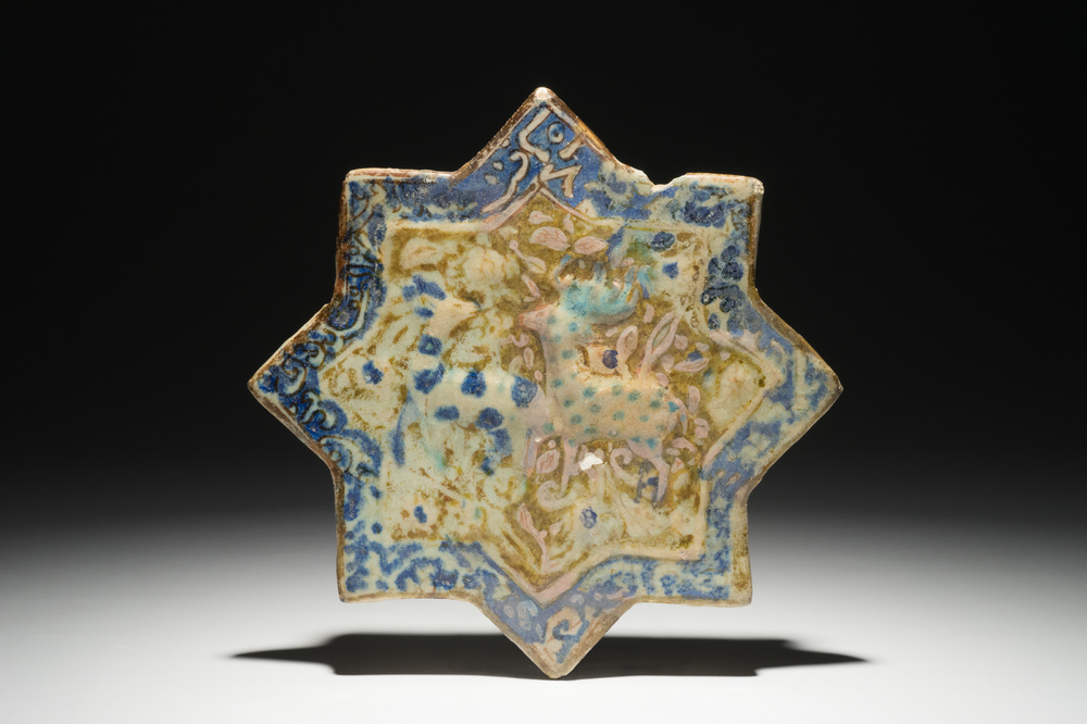 An Islamic luster glaze relief-decorated star tile, Kashan, Iran, 13th C.