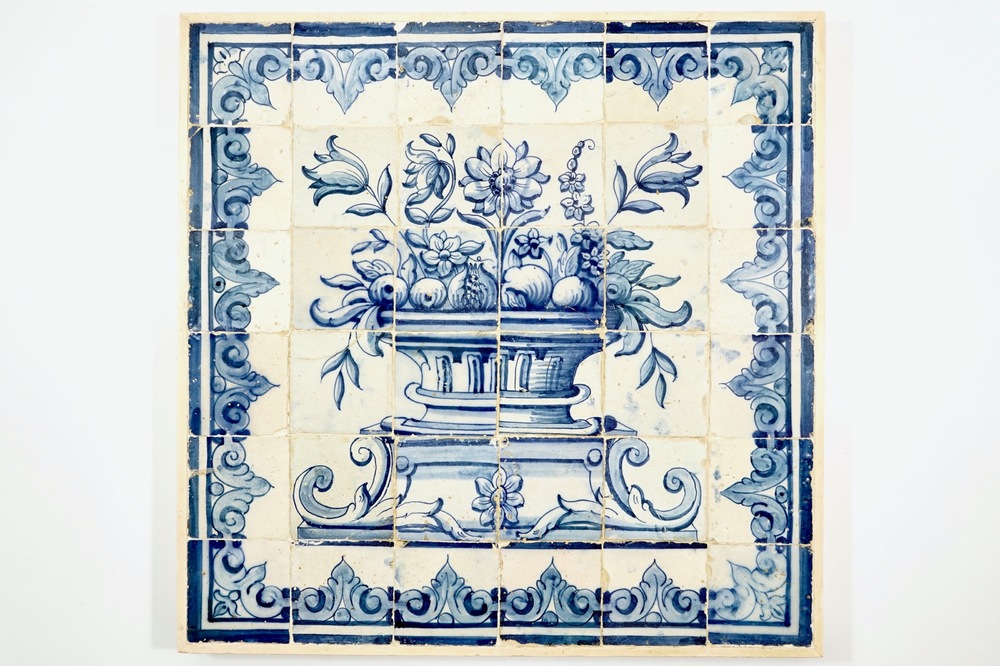 A large Portuguese blue and white tile mural with a flower vase, prob. Lisbon, 17/18th C.