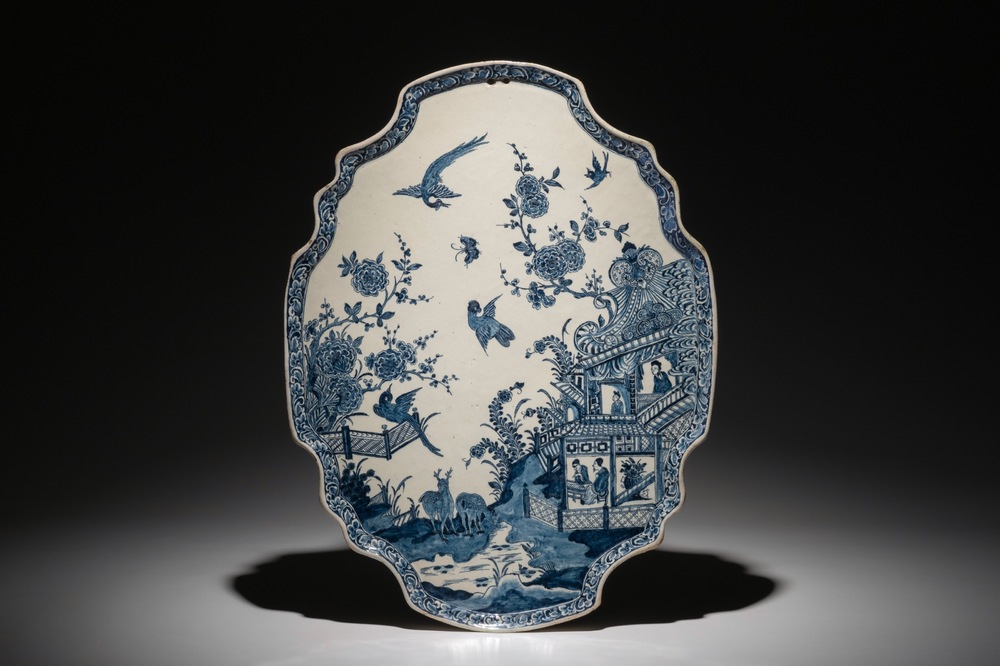 A large Dutch Delft blue and white chinoiserie plaque, 18th C.