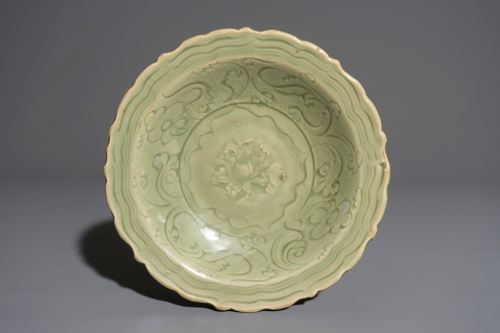 A Chinese Longquan celadon incised &quot;Peony&quot; dish, early Ming