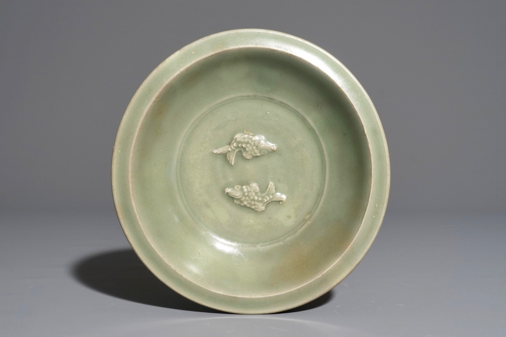 A Chinese Longquan celadon twin fish plate, Ming