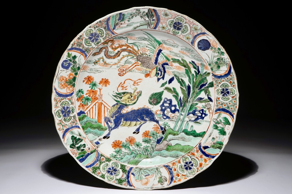 A large Chinese famille verte qilin and phoenix charger, Kangxi