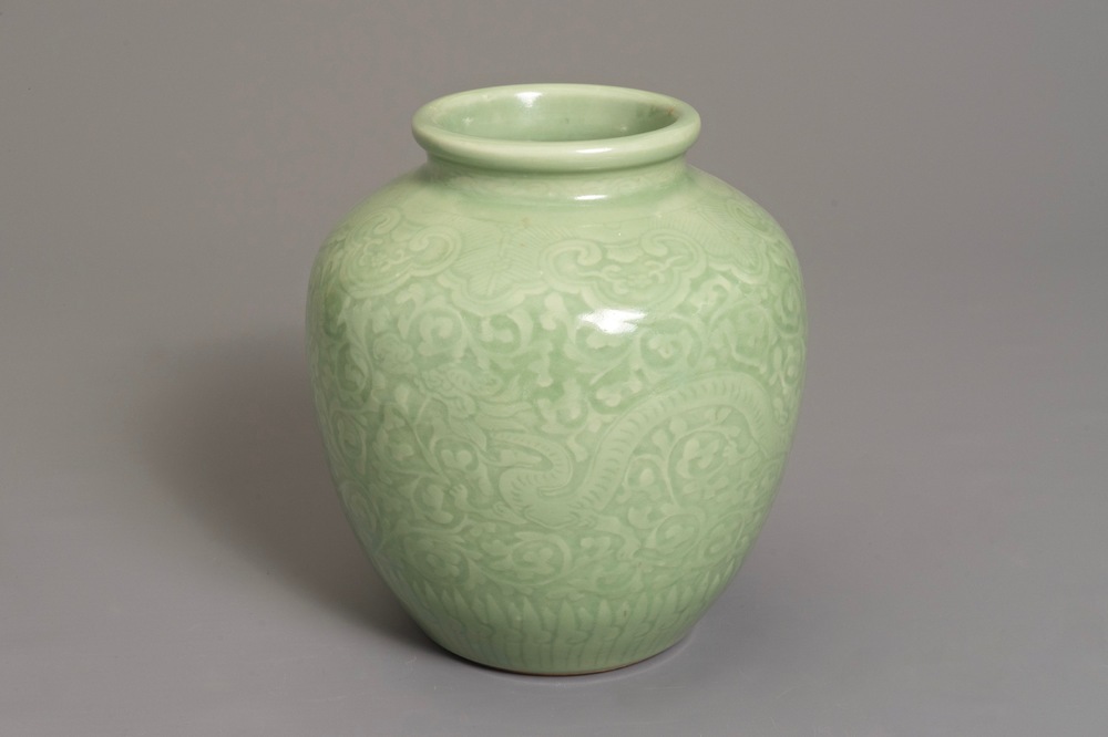 A Chinese celadon-glazed vase with underglaze dragon design, 19/20th C.