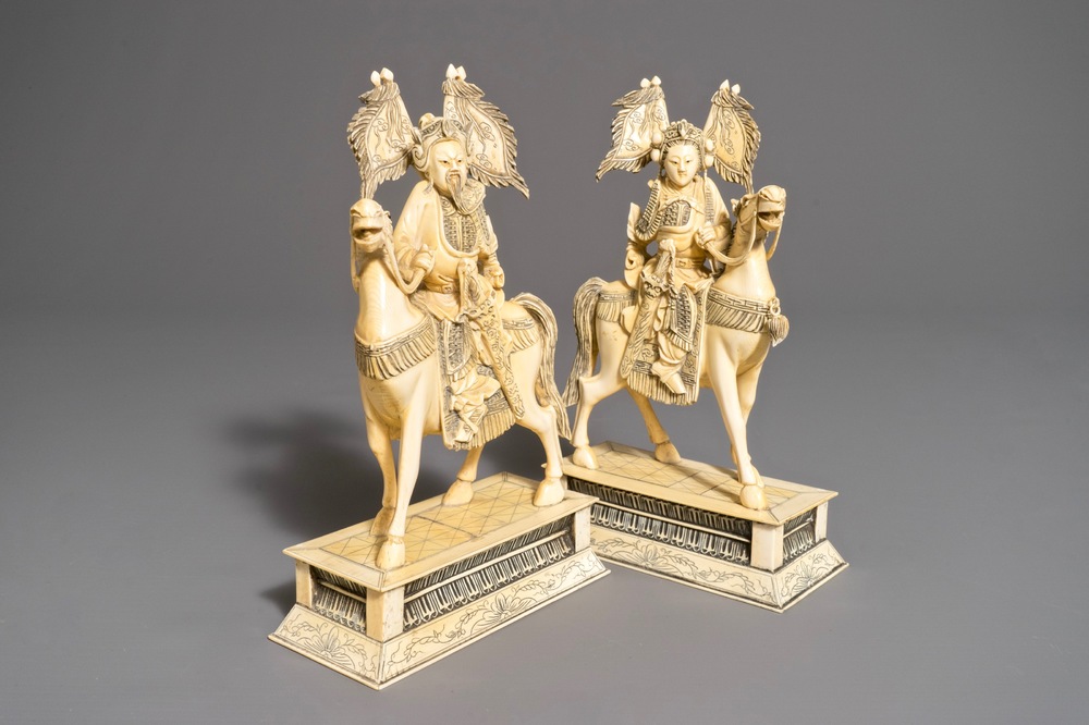 A pair of Chinese carved ivory horseriders, 19th C.