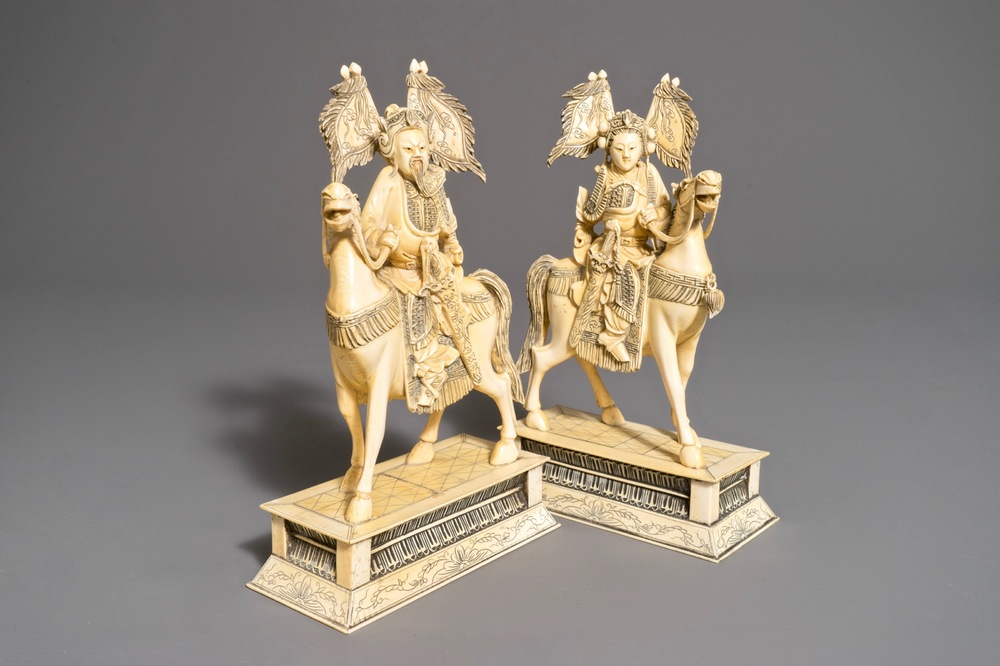 A pair of Chinese carved ivory horseriders, 19th C.