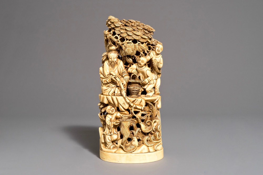 A Chinese carved ivory fishermen group, 19th C.