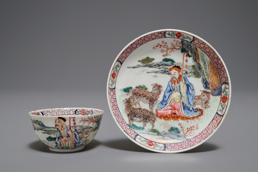 A Chinese famille rose cup and saucer depicting Lie Ti Guai with three goats, Yongzheng