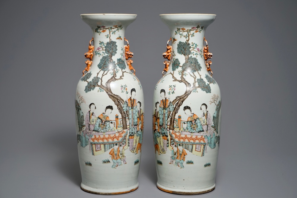 A pair of large Chinese qianjiang cai vases with ladies in a garden, 19/20th C.