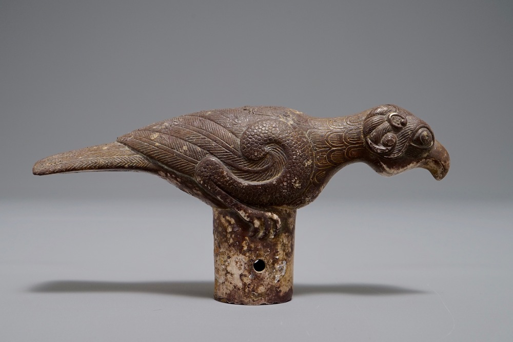 A Chinese bronze cane handle in the shape of a mythological bird, Han or later